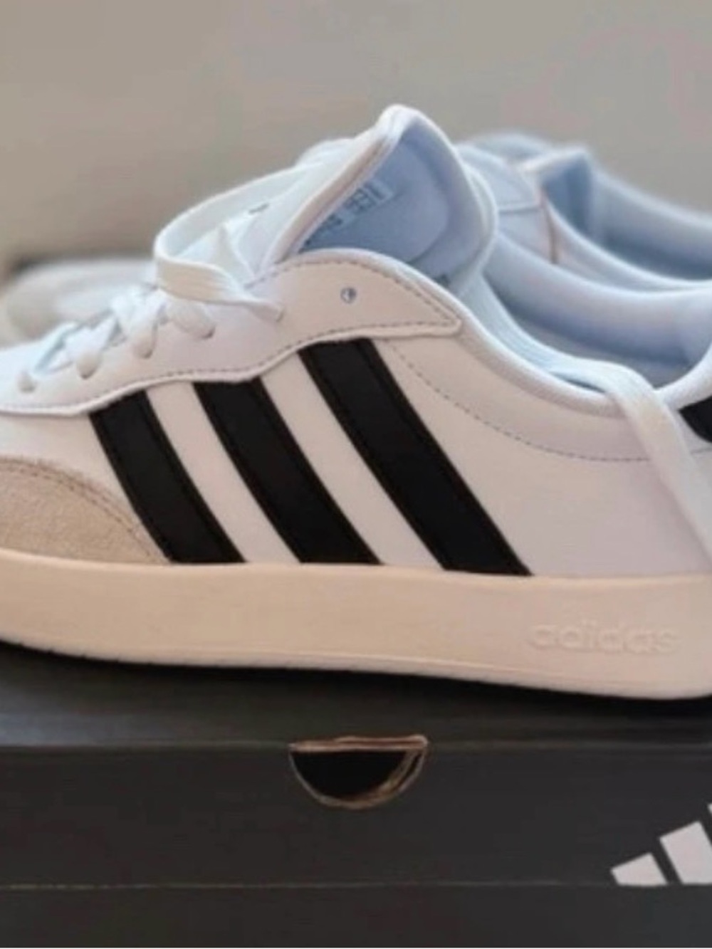 adidas women’s White Sneakers with Black Three Stripes